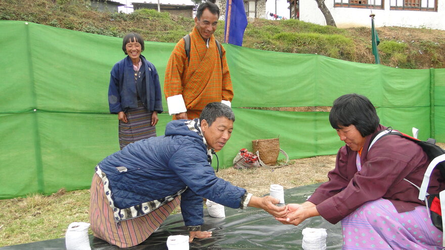 Bhutanese farmers swapping seeds at a biodiversity fair