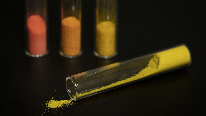 Coloured powder in glass vials