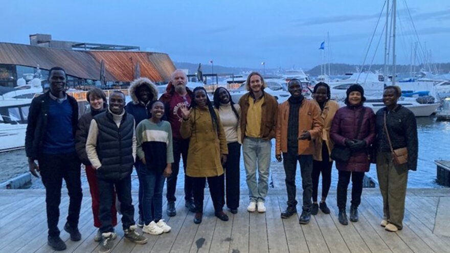 Staff and students on the NORPART programme gather in Oslo after a project dinner.