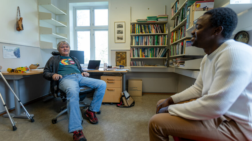 Tor A. Benjaminsen and postdoc Ibrahima Poudiougou in Benjaminsen's office at the Norwegian University of Life Sciences