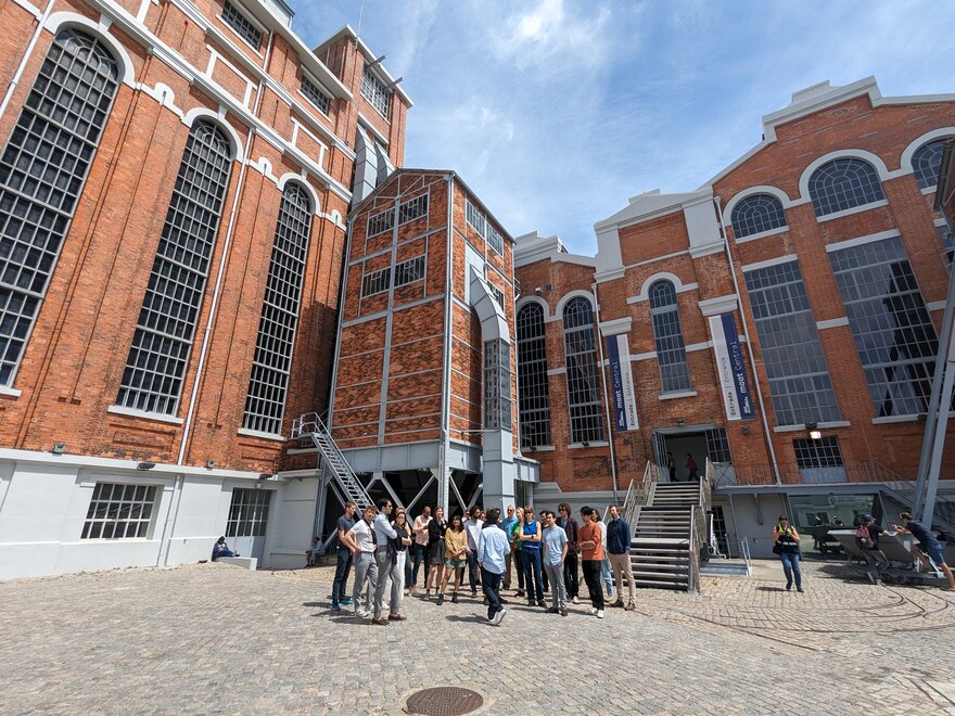 Empowered Futures research school members standing outside MAAT, Lisbon