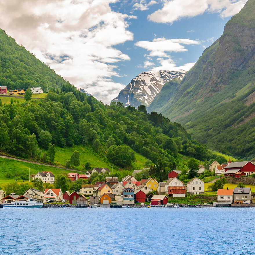 Houses built around the coastline of Sognfjord, Norway.