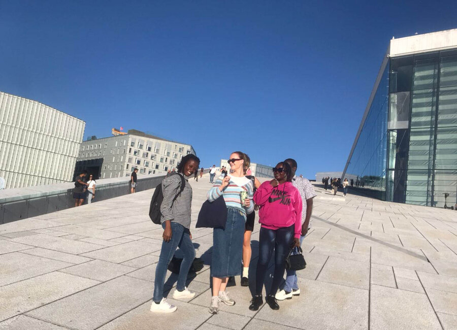 Poni Victoria and fellow students of NMBU's Master's in Global Development Studies tour Oslo's Opera House.
