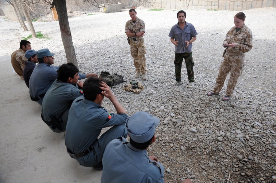 Training police in Musa Qala, Afghanistan (21 February 2010). The translator talks about the exercise they just completed through Corporal Natasha Richards Royal Military Police. 