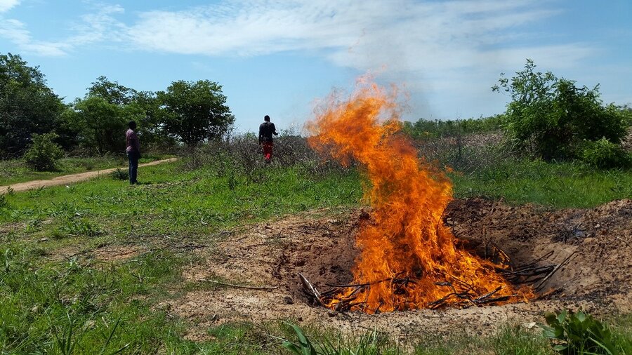 Biochar-making method, known as flame-curtain kiln.
