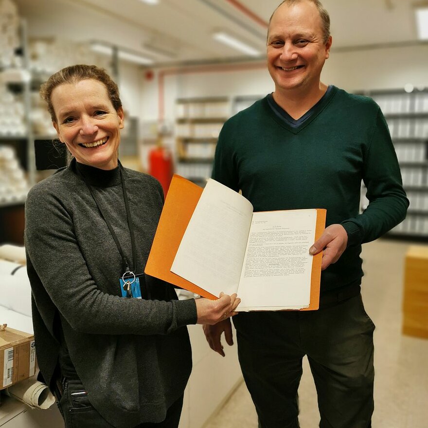 Professor Annegreth Dietze-Schirdewahn and Associate professor Bjørn Anders Fredriksen holding one of the historical IFLA documents when preparing meetings in the project group. 